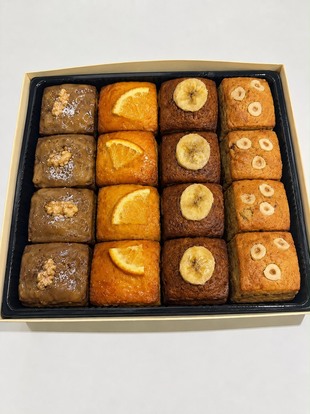 Assorted Mini Cakes box of 16 pieces - banana, orange, hazelnut and coffee walnut cake cubes